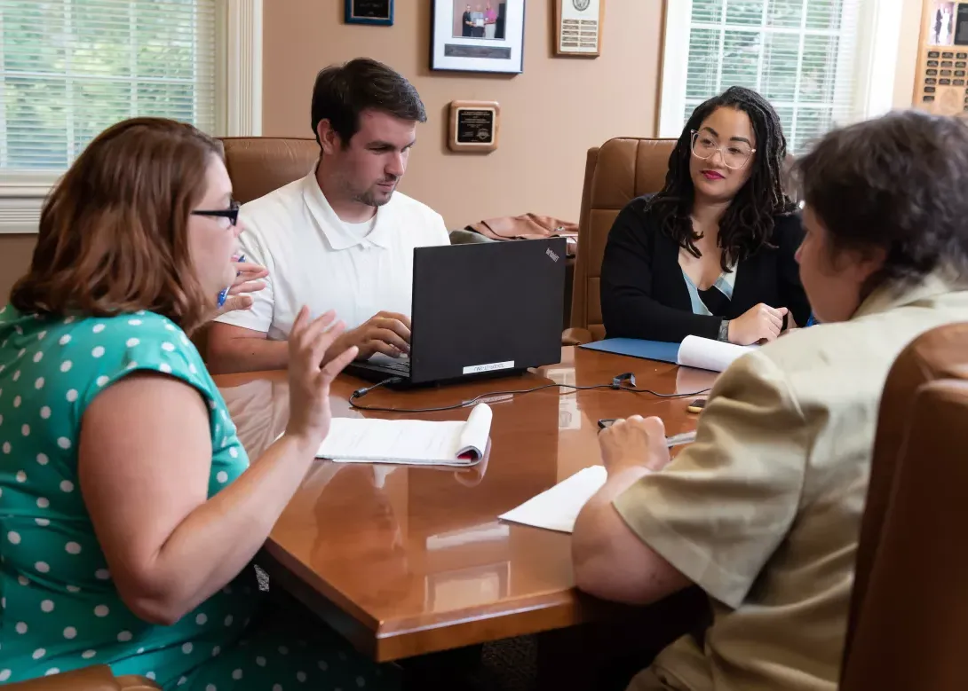 people communicating in a meeting